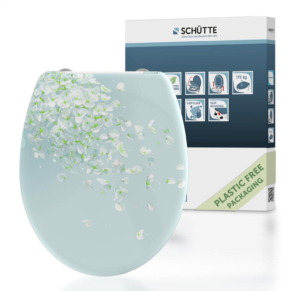 Schütte toiletbril met soft-close quick-release bloem in de wind