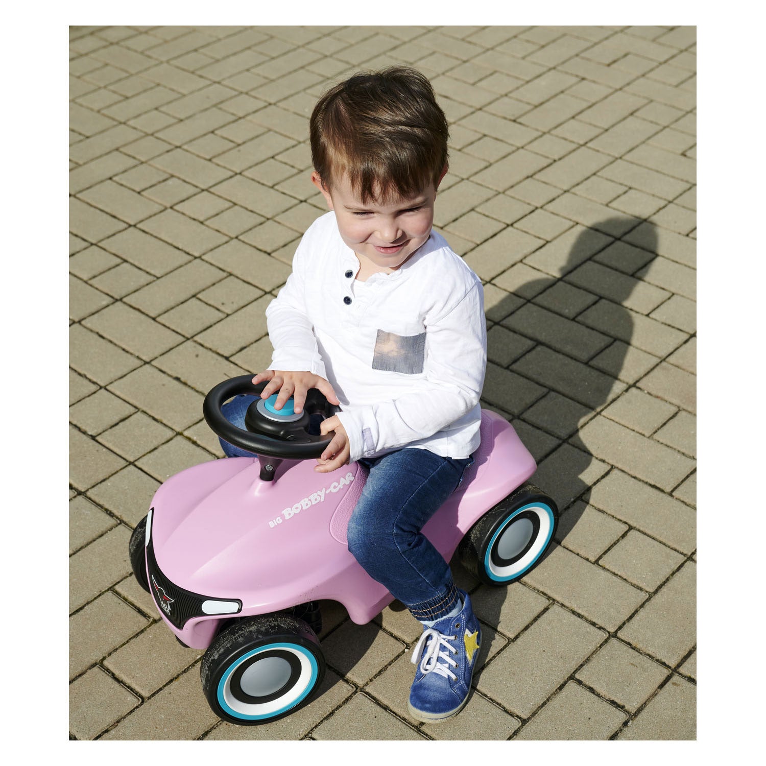 Grote bobby auto neo roze loopauto