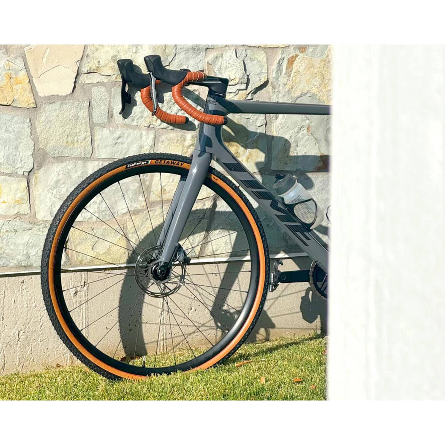 Challenge - ontsnapping race clincher tlr 700x40c zwart bruin