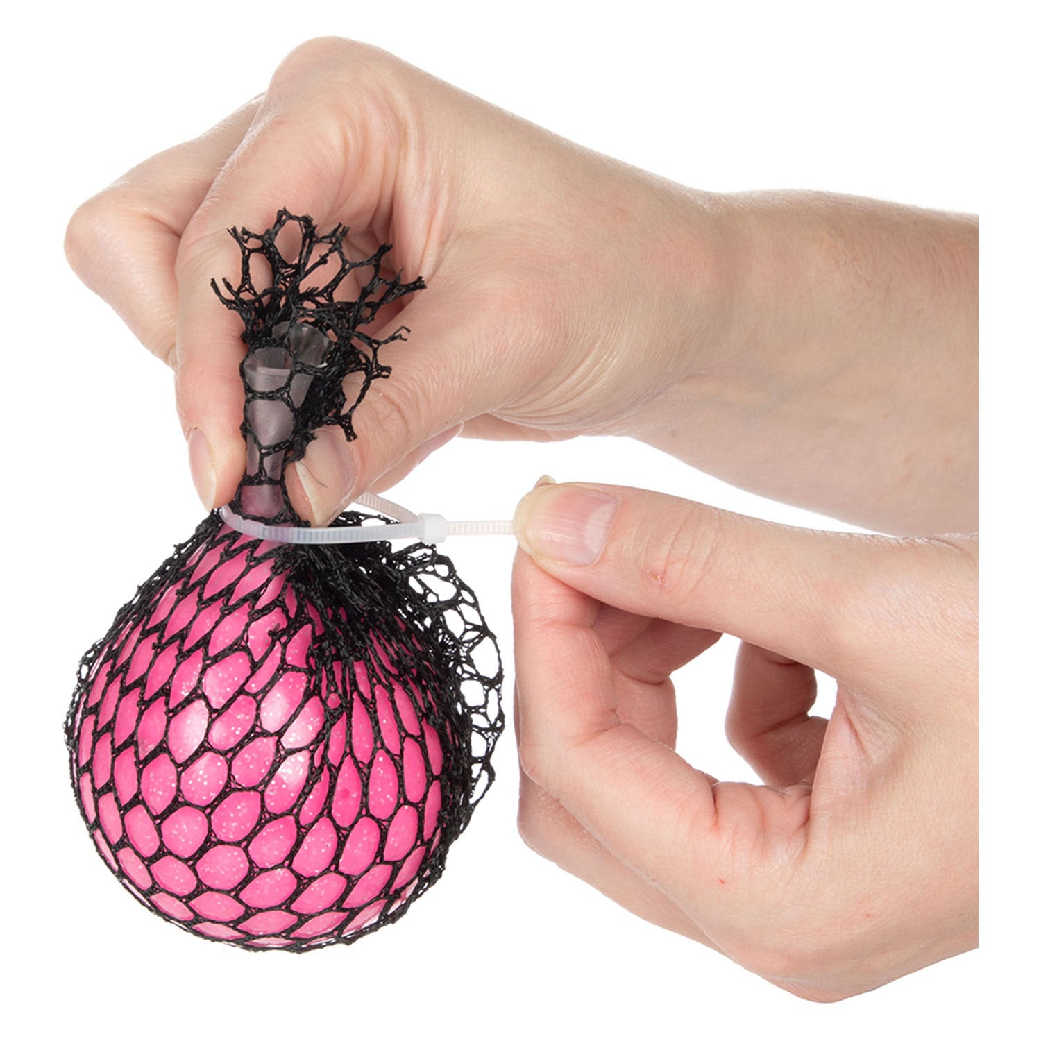 Toi-toys kinderhoes maak een knijpbal in een net 4 assorti