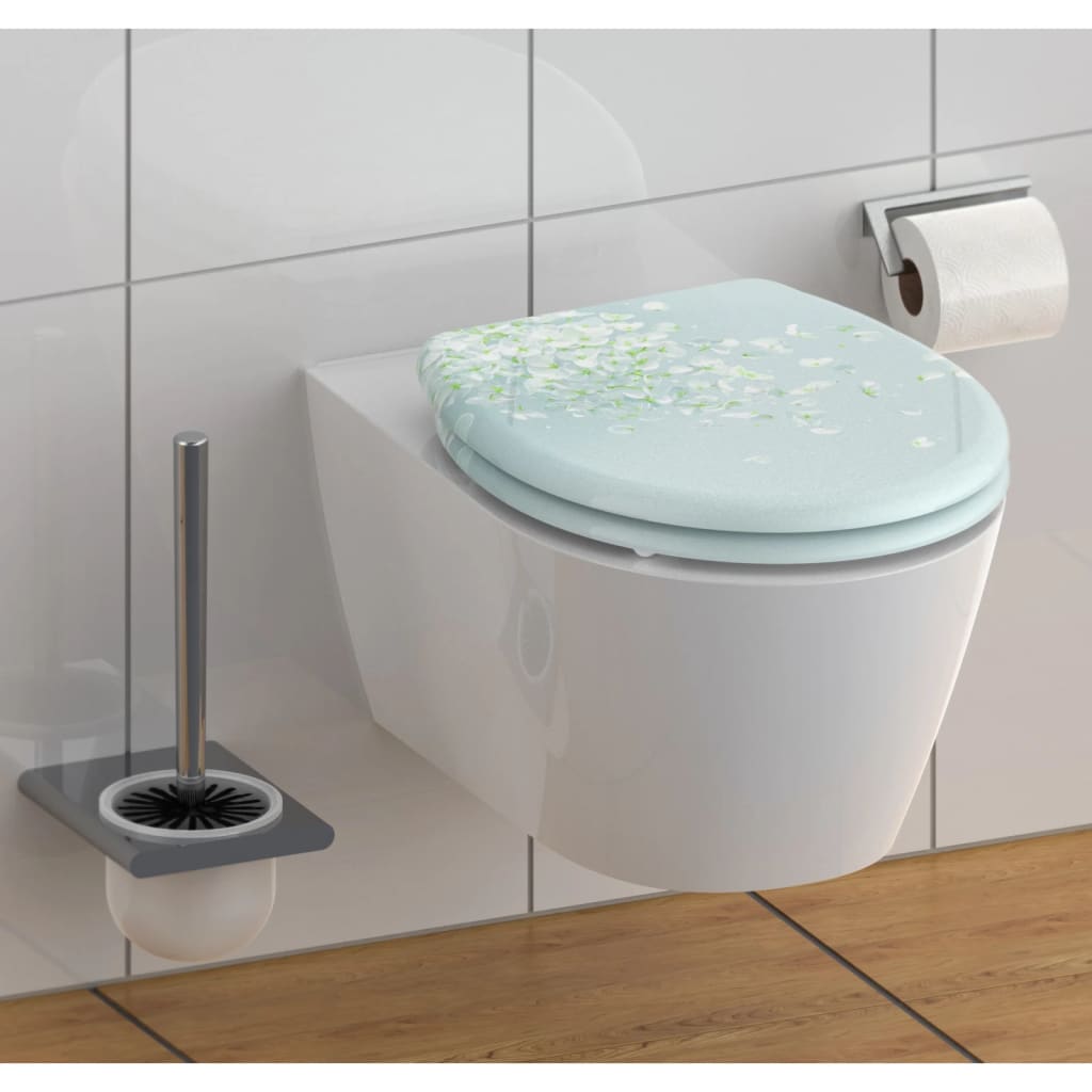 Schütte toiletbril met soft-close quick-release bloem in de wind