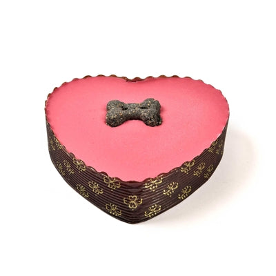 De blaffende bakkerij-yoghurt bedekte pawty cake roze hart met kaars