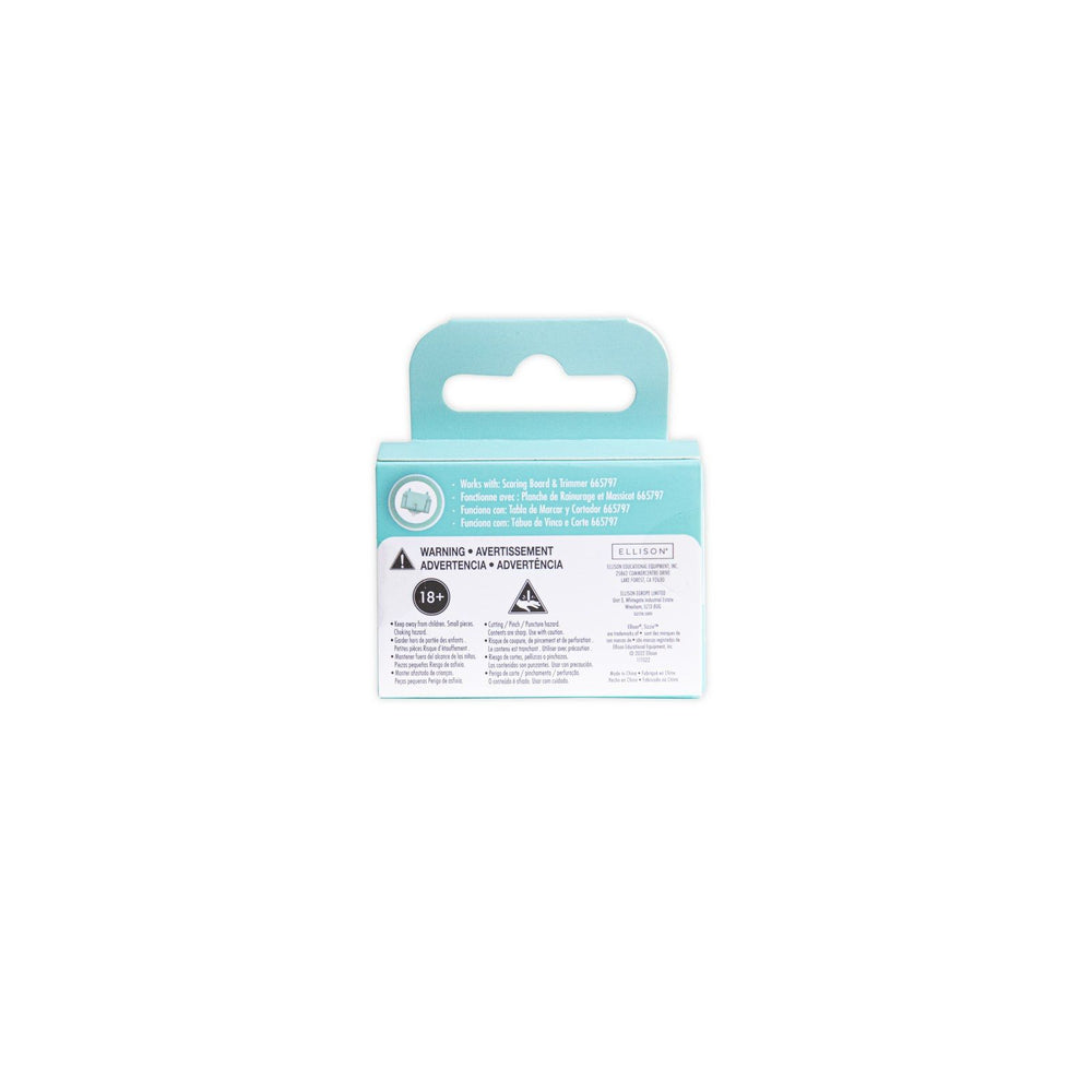 Sizzix • replaceable scoring board and trimmer blades