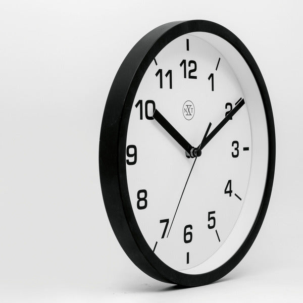 Nextime nx-7321zw wandklok nxt diameter 20cm kunststof zwart, witte wijzerplaat