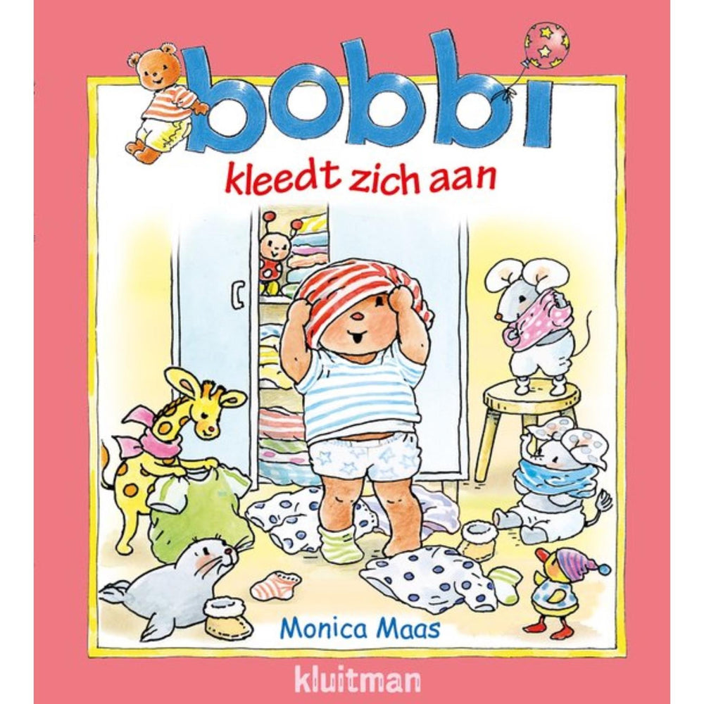 Kluitman bobbi kleed zich aan