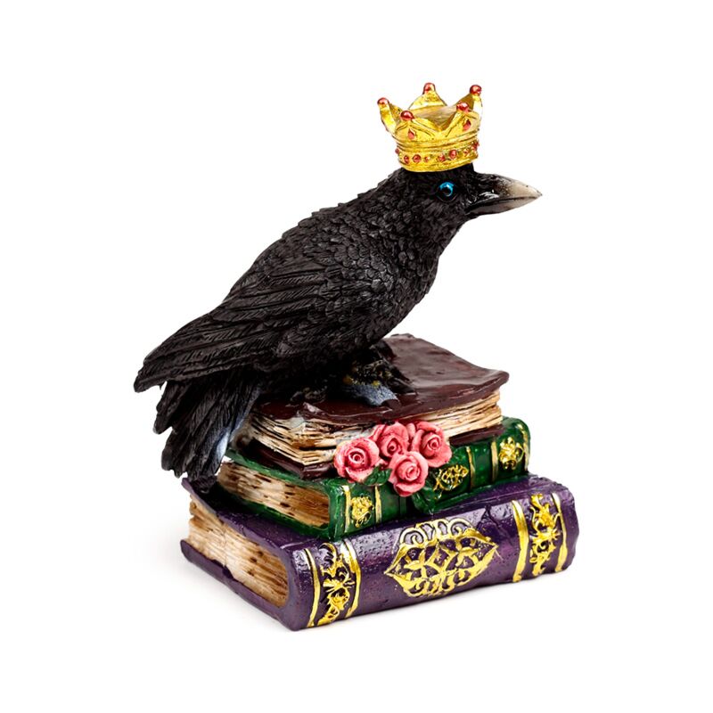 Kraai met kroon staan op boeken