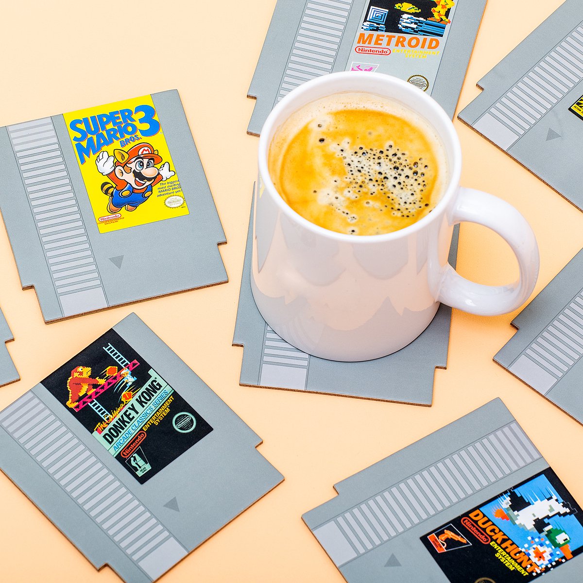 Paladone nintendo nes cartridge onderzetters – retro drinkonderzetters voor gamers, set van 8, officieel gelicentieerd-
