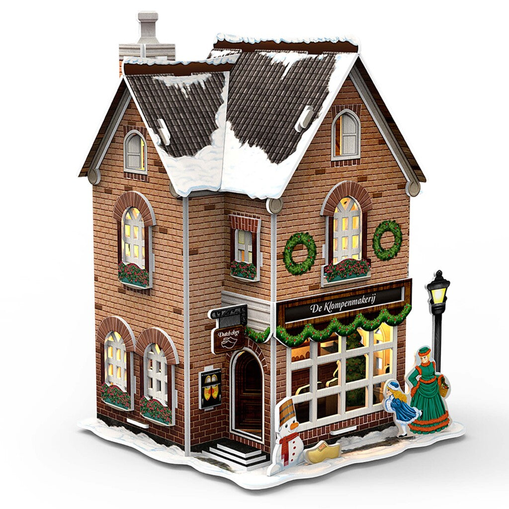 Kubieke leuke 3d puzzel hollands huisje winter klompenmakerij + licht 53 stukjes