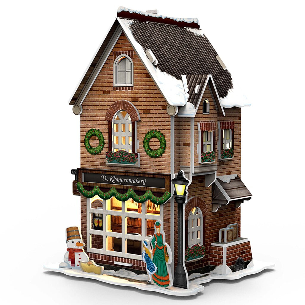 Kubieke leuke 3d puzzel hollands huisje winter klompenmakerij + licht 53 stukjes
