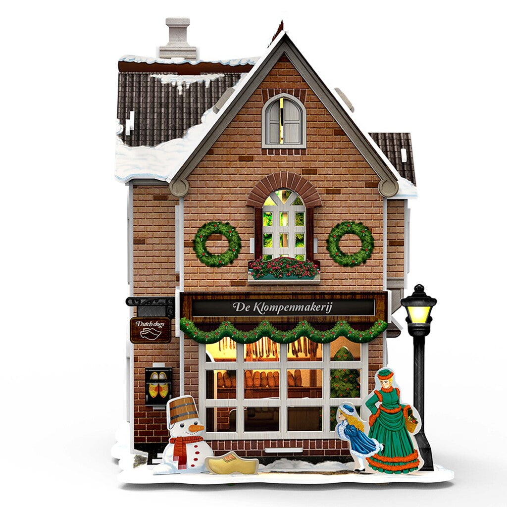 Kubieke leuke 3d puzzel hollands huisje winter klompenmakerij + licht 53 stukjes
