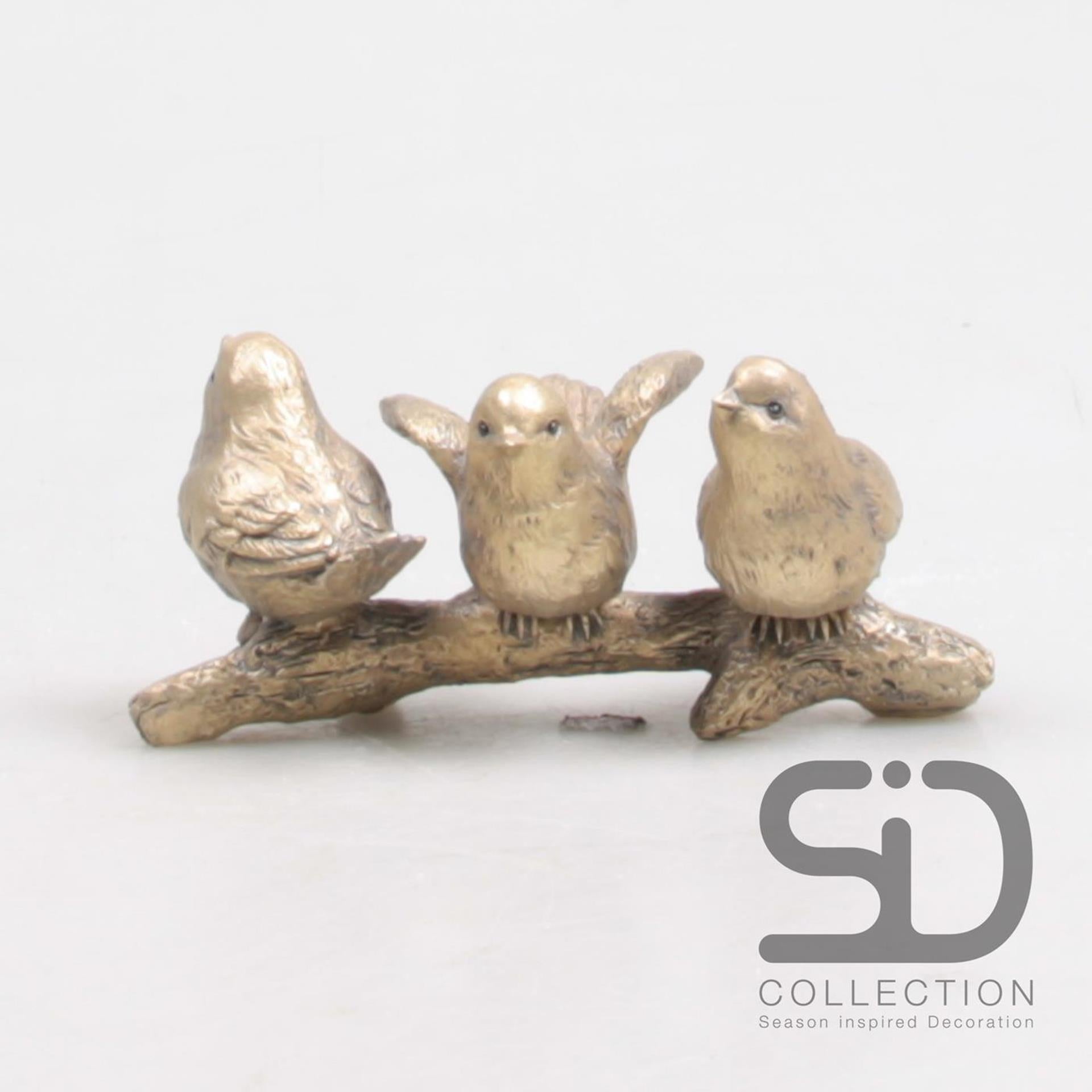 Season inspired decoration vogels op tak goud