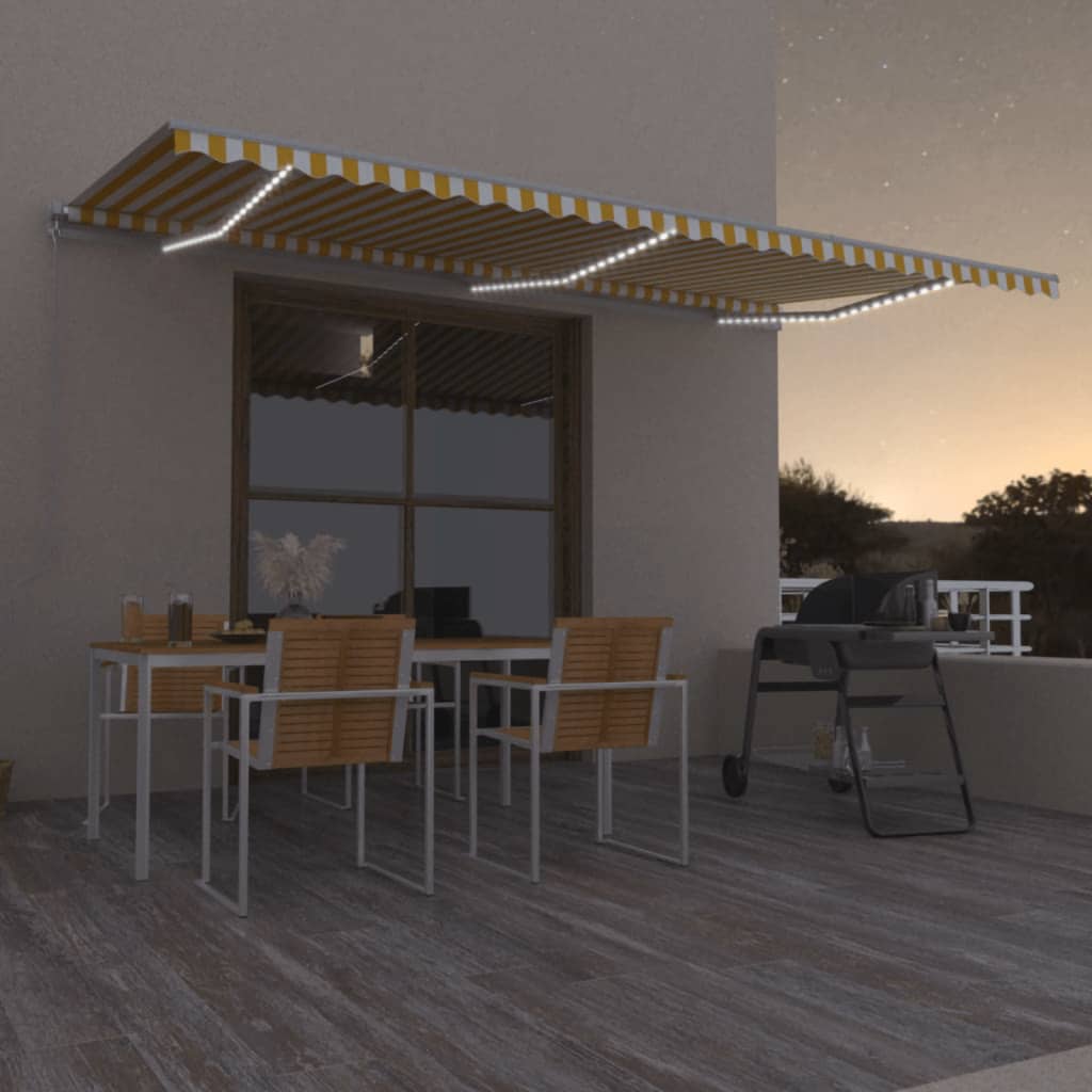 VidaXL Luifel handmatig uittrekbaar met LED 600x300 cm geel en wit