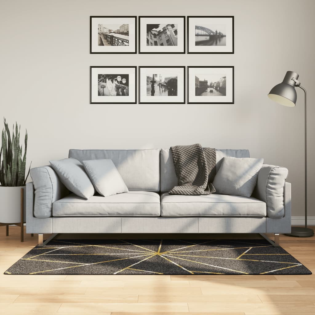 VidaXL Vloerkleed wasbaar antislip 80x150 cm zwart en goudkleurig