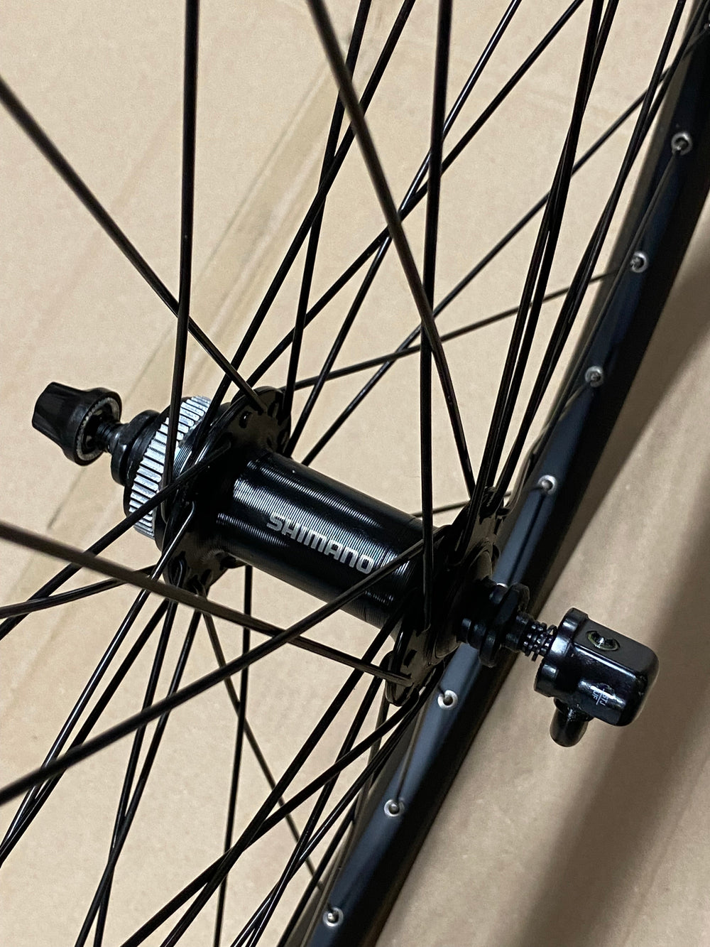 Roland voorwiel 27 21-584 taurus alu. zwart shimano tx505 schijfrem